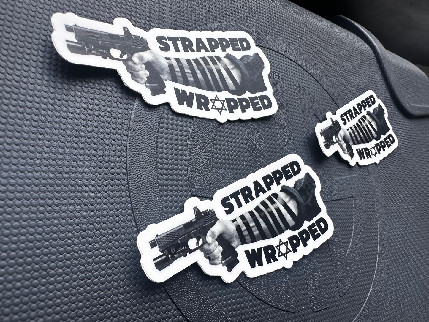 STRAPPED AND WRAPPED