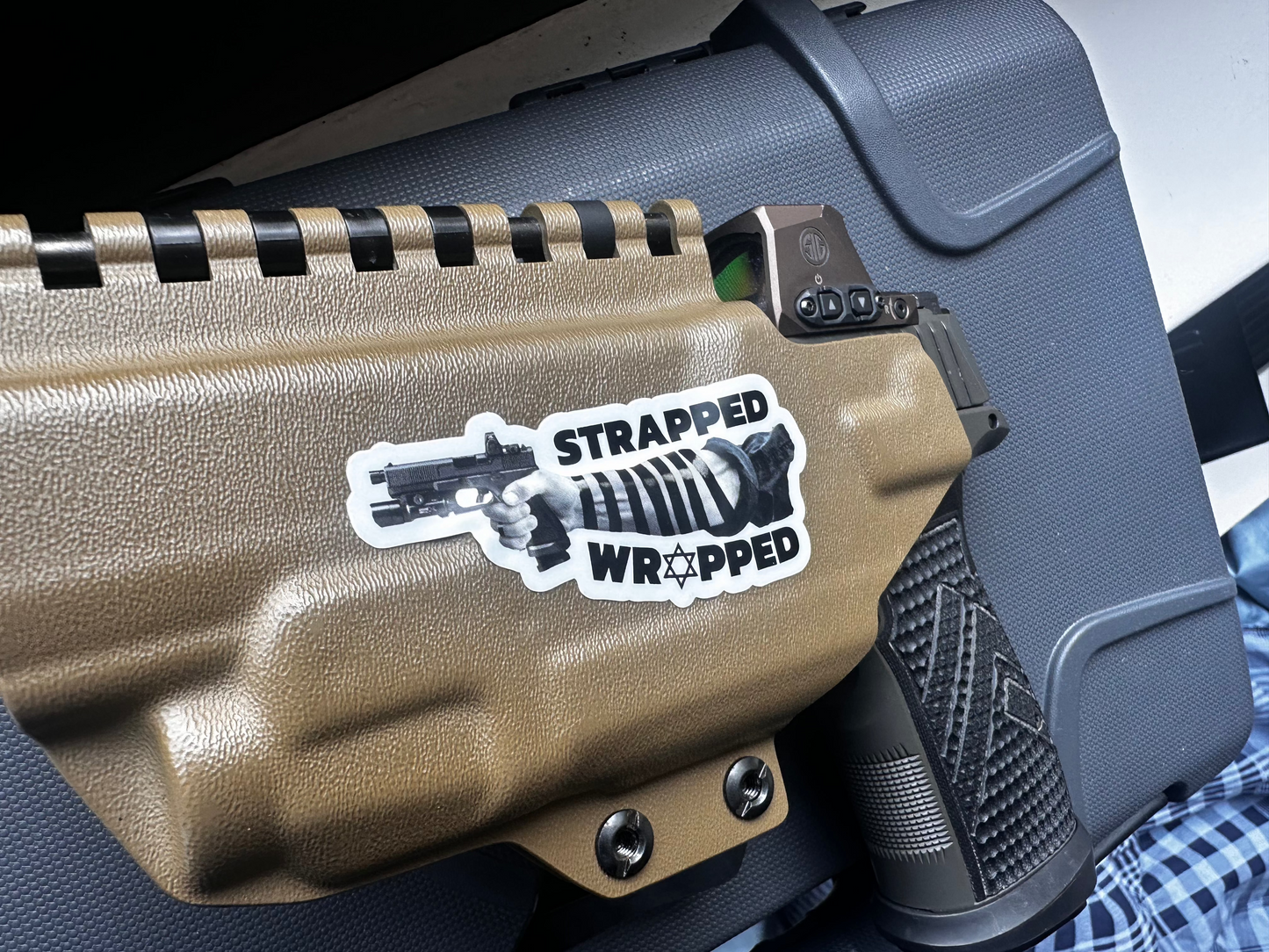 STRAPPED AND WRAPPED